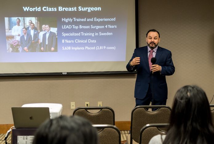 Dr. Guerra speaking at a seminar