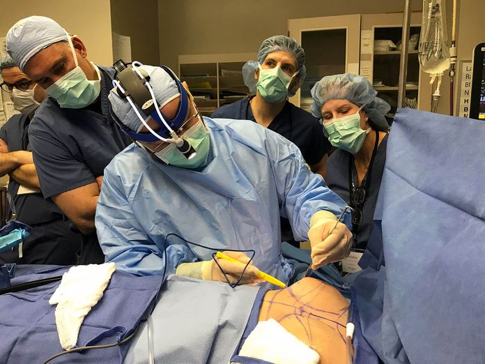 Dr. Guerra performing operation