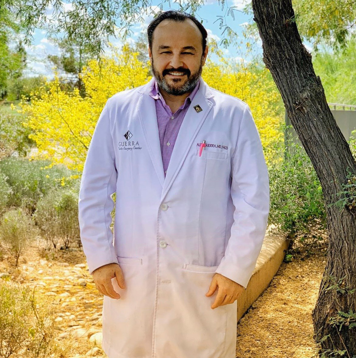 Dr. Aldo Guerra standing outdoors